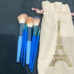 Small assortment of makeup brushes (comes with the bag)